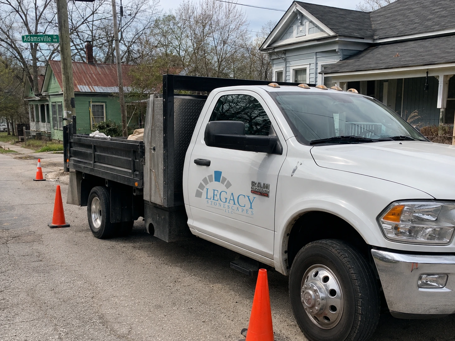 Masonry crew truck on a narrow Adamsville street in west Atlanta