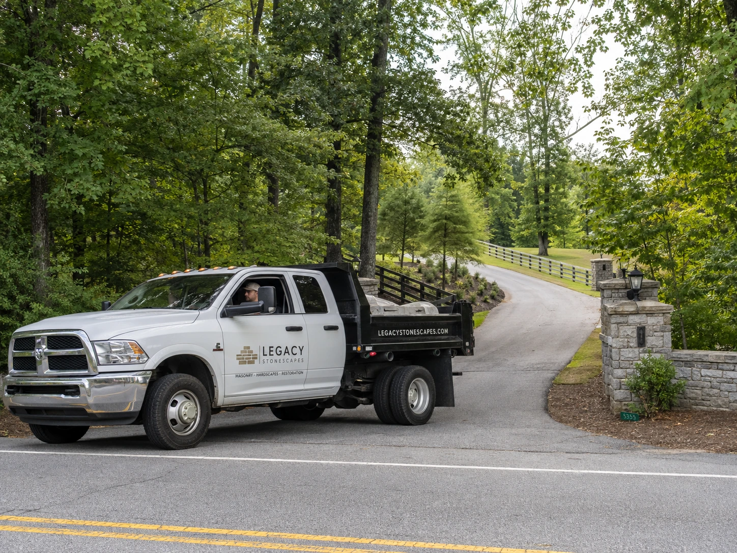 Masonry truck turning onto a private drive near Stonewall Tell Road in South Fulton