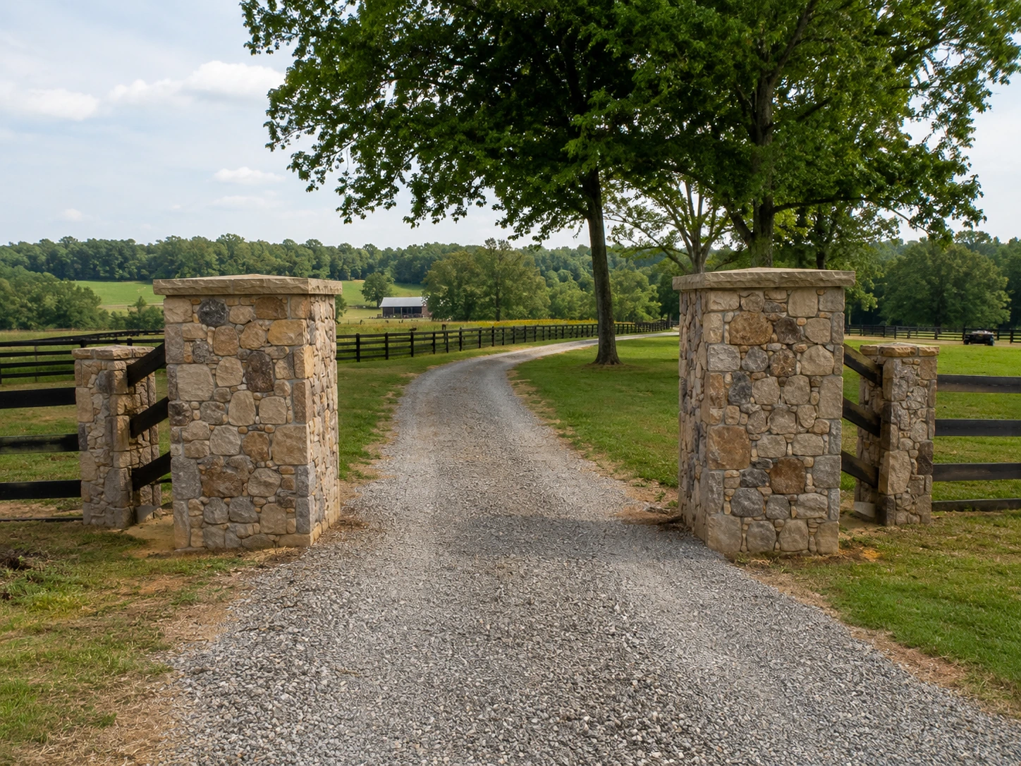 Stone gate columns at a farm entrance on Cedar Grove Road in South Fulton
